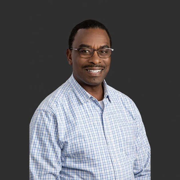 Headshot of Godfrey Nalanya