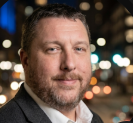 Headshot of Roger Dickens