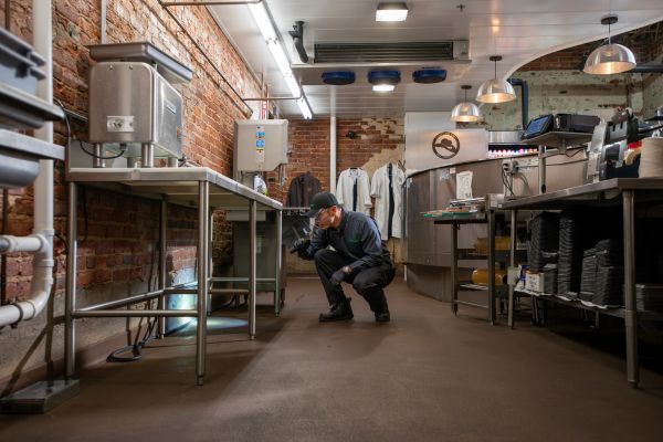 technician inspecting kitchen