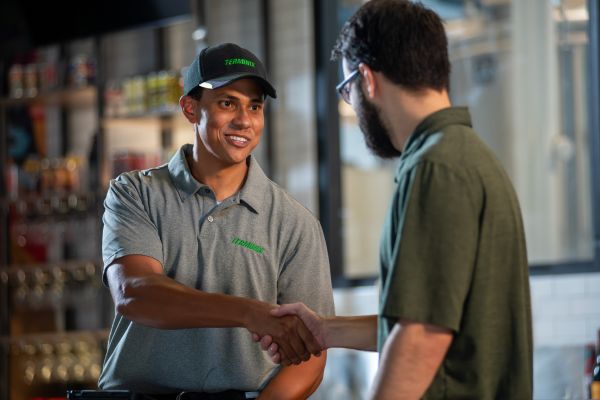 customer and technician handshake