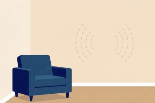 A minimalist illustration of a living room corner with a blue armchair, featuring sound waves drawn on the wall to represent noises inside the wall.